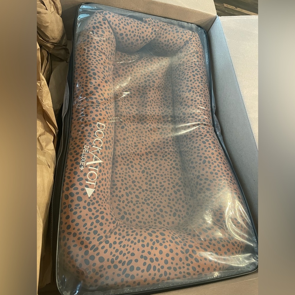 dock a tot (size: deluxe +) with brown leopard cover